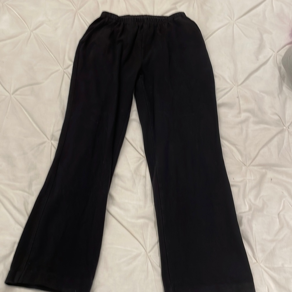 Black straight-leg sweats, airy material, two pockets